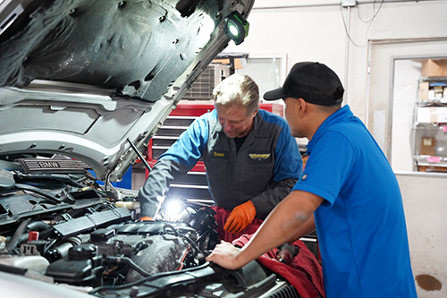 Technicians at work performing maintenance | Southend Auto Care